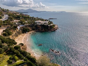 On the beach, sun-loungers, beach towels