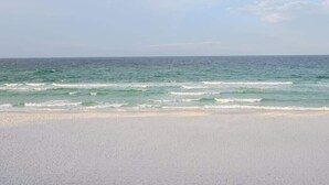 A beach with waves approaching the shore. - On Cloud 9 | Gulf-Front, Private Beach (Santa Rosa Beach)