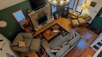 Smart TV, fireplace, DVD player, books