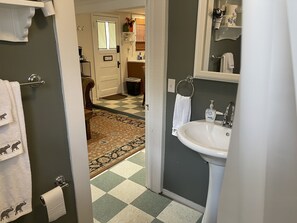 Combined shower/tub, hair dryer, towels, soap