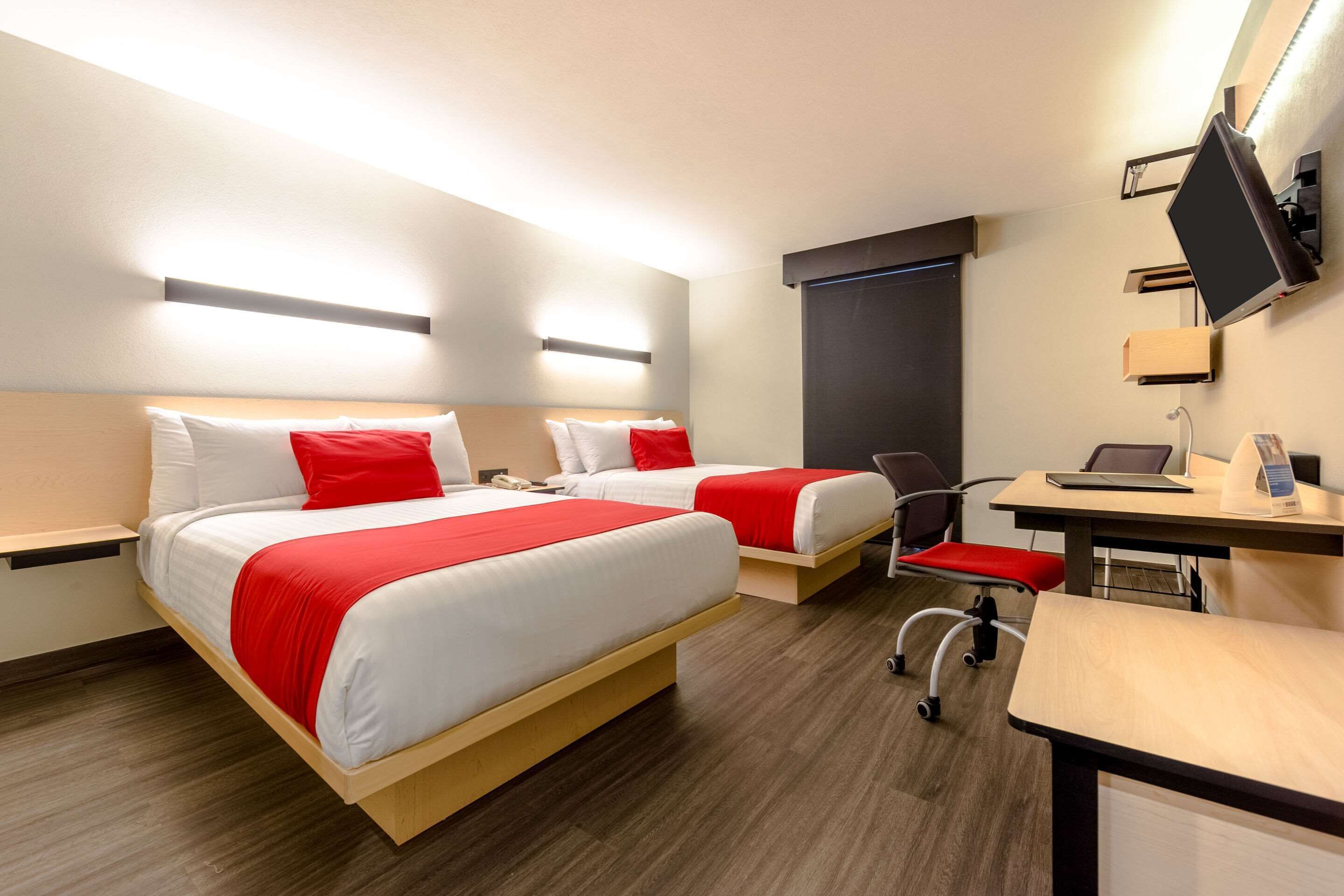 standard room, 2 queen beds, non smoking | premium bedding, down duvets, in-room safe, desk