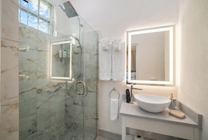 Shower, hair dryer, towels, soap
