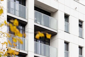 Stunning views from the spacious balconies with glass railings.