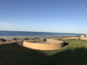 Relax on the beach with a clear view of the ocean from this seaside lounge.