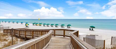 On the beach, sun loungers, beach towels