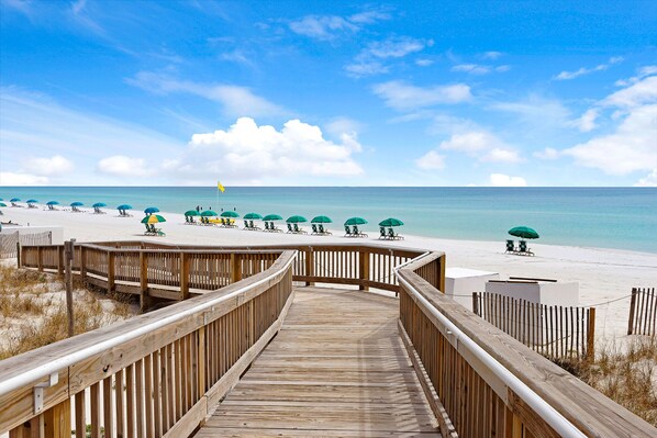 On the beach, sun loungers, beach towels