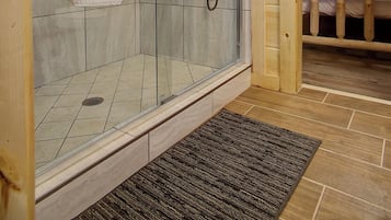 Combined shower/tub, hair dryer, towels, soap