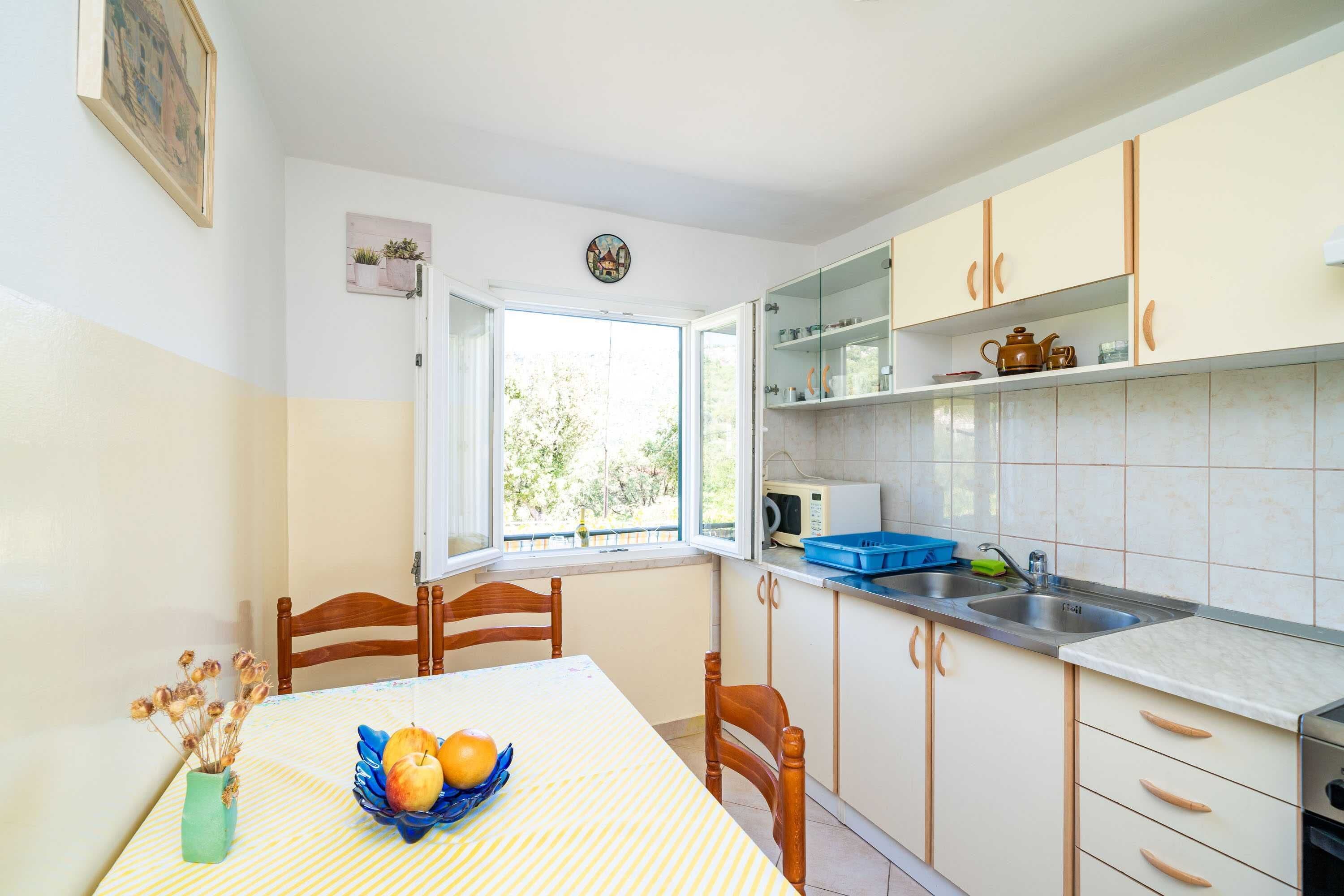 Apartment (Three-Bedroom Apartment) | Private kitchen | Fridge