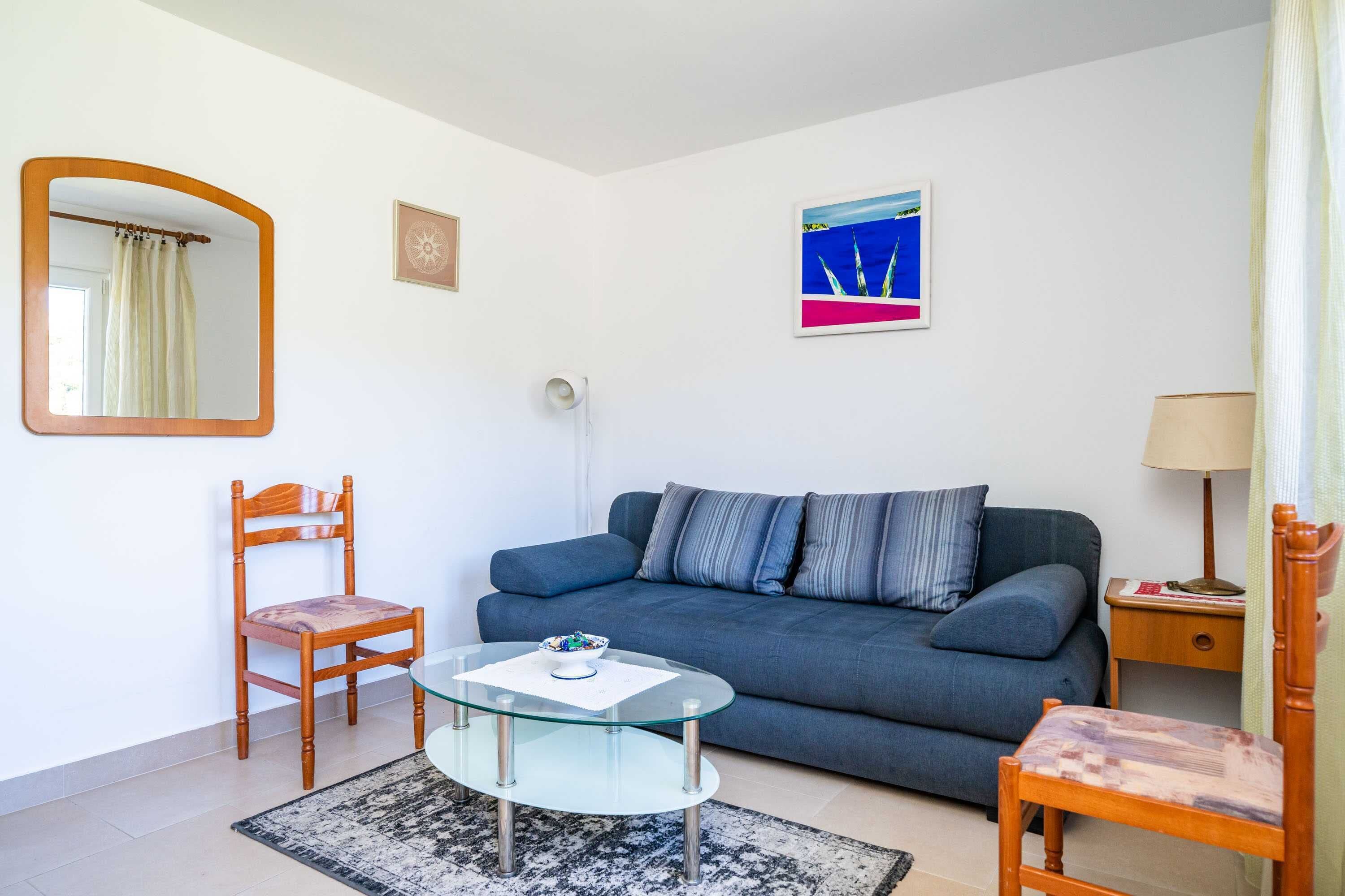 Apartment (Three-Bedroom Apartment) | Living room | TV