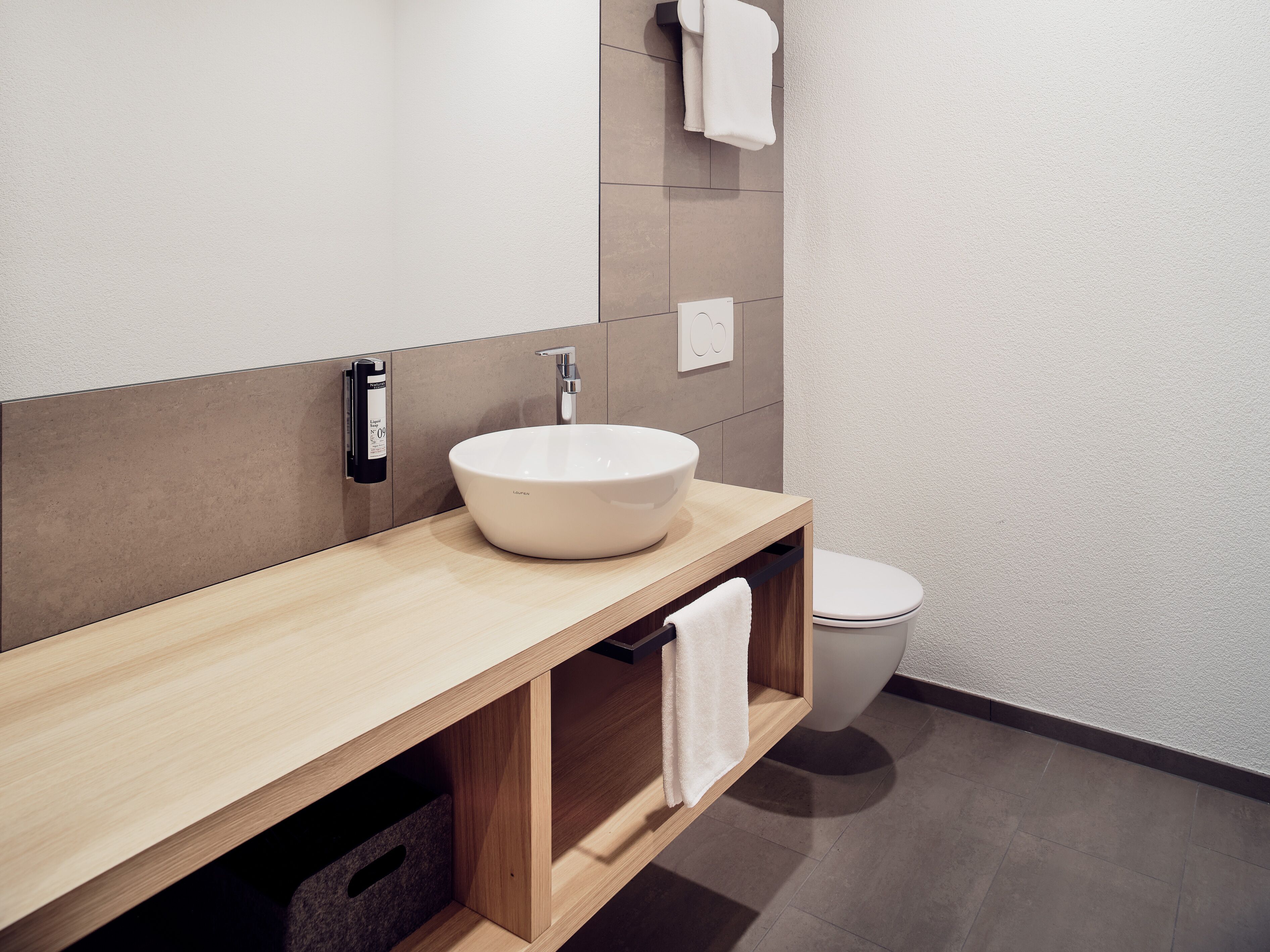 grand studio suite | bathroom | shower, hair dryer, towels