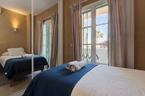 2 dormitorios, tabla de planchar con plancha, wifi gratis y ropa de cama