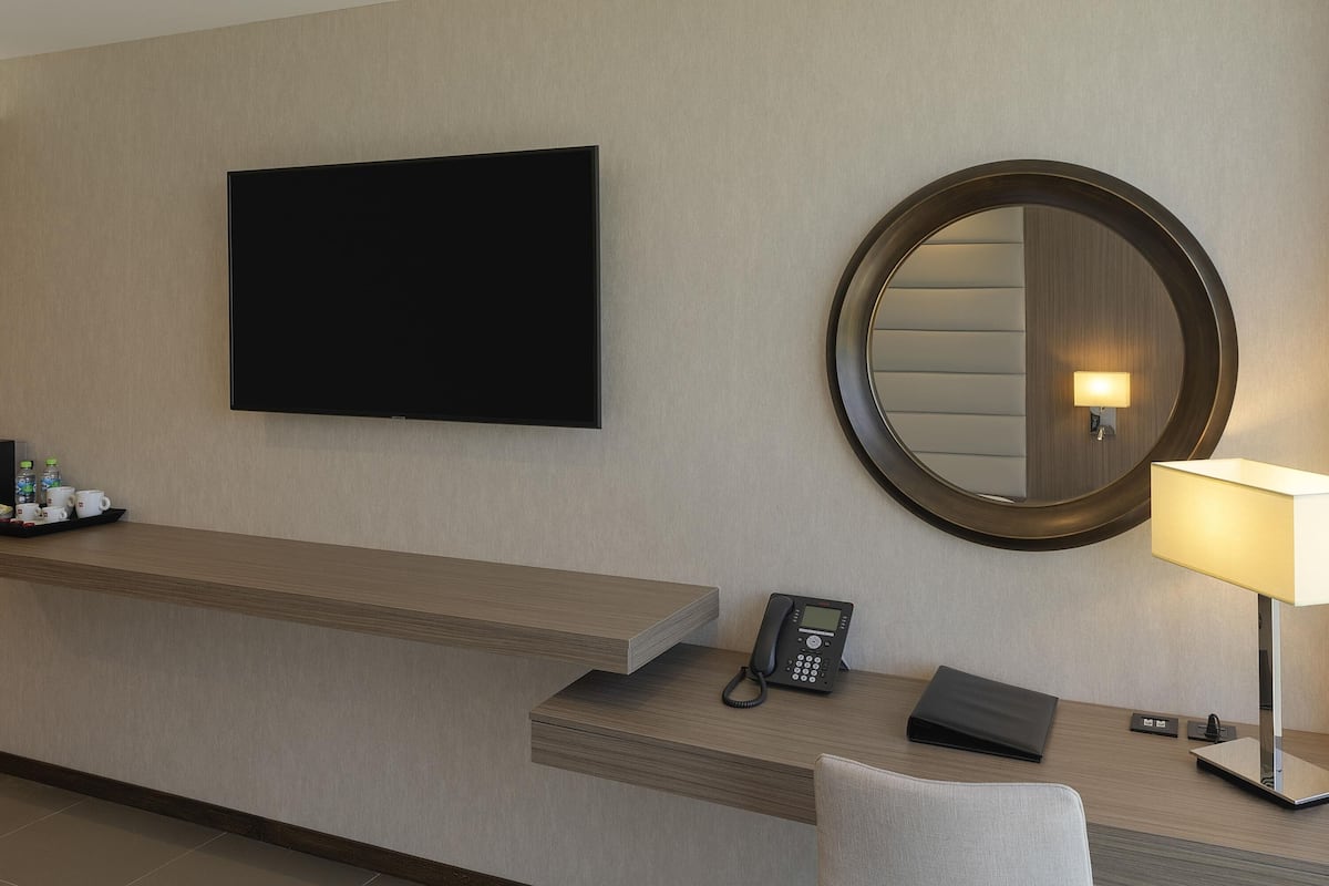 Premium bedding, down comforters, minibar, in-room safe