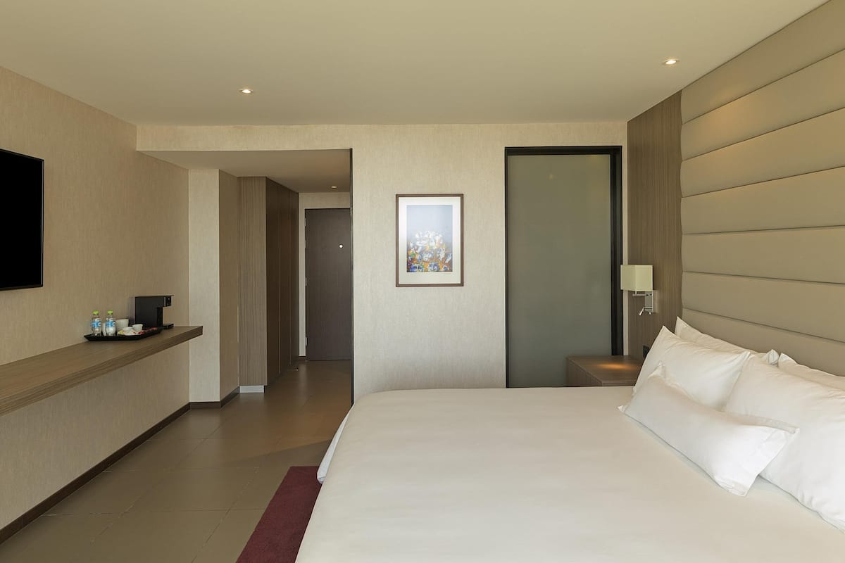 Hochwertige Bettwaren, Daunenbettdecken, Minibar, Zimmersafe