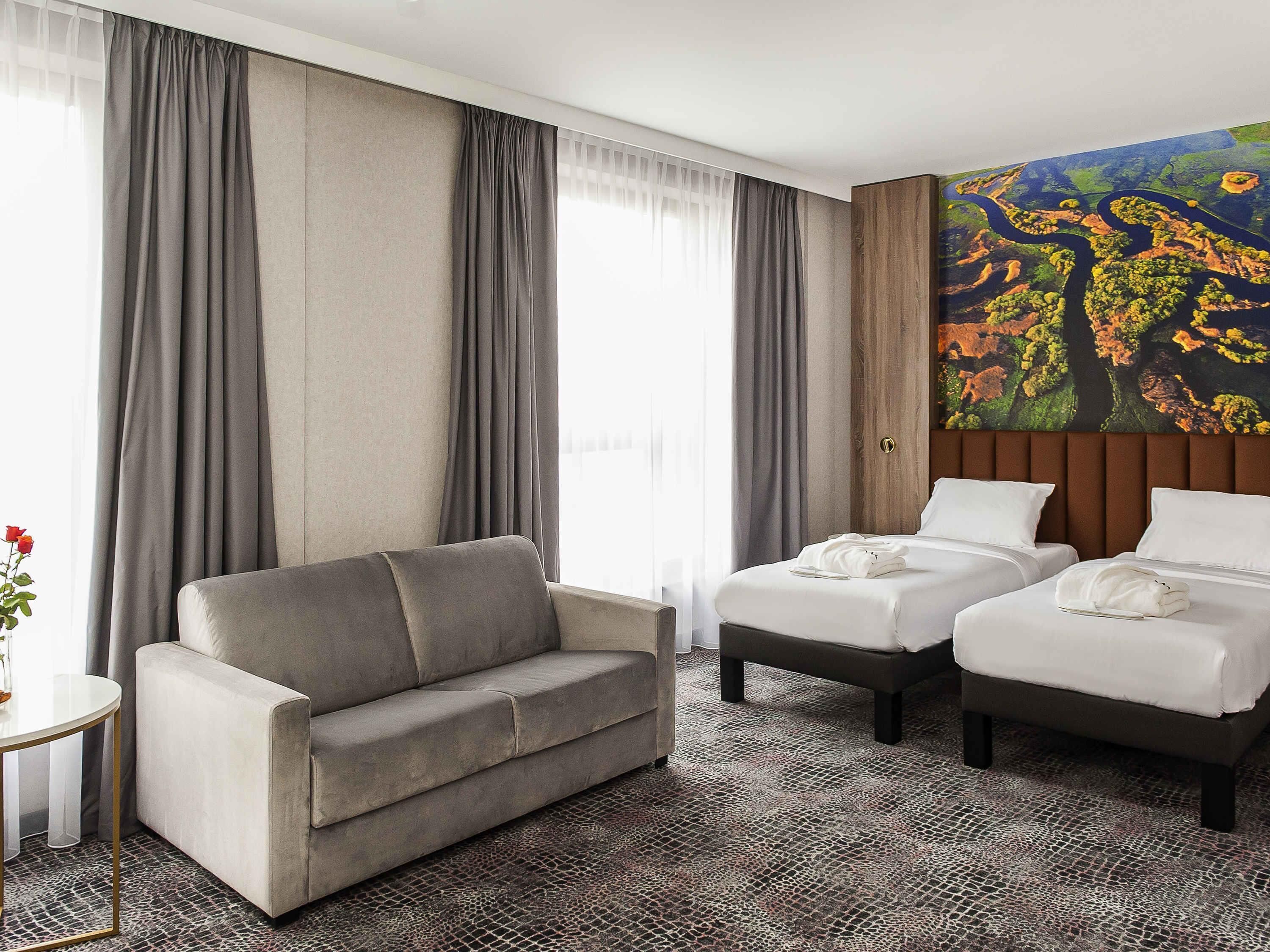 Privilege, Room, Multiple Beds | Minibar, desk, laptop workspace, soundproofing