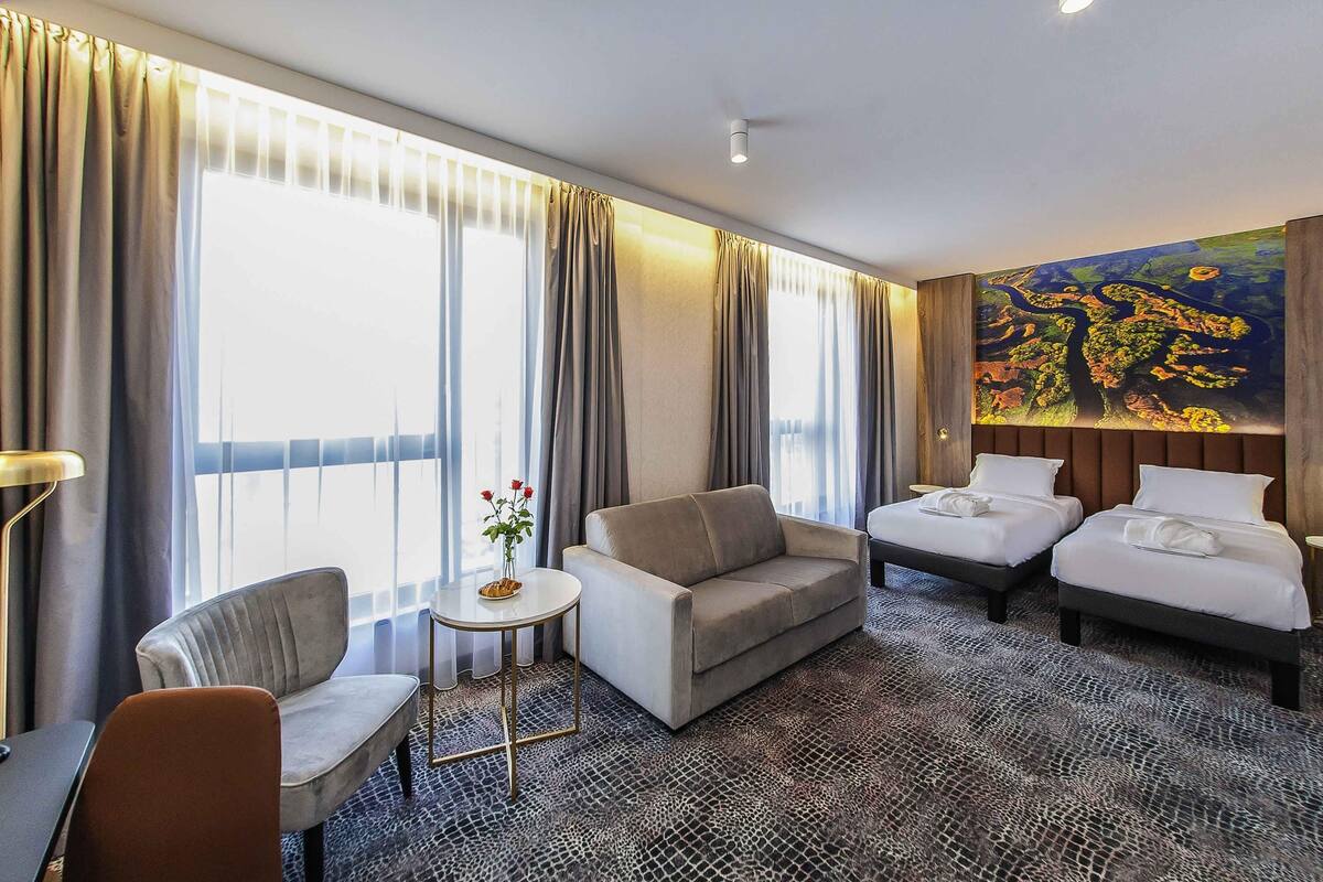 Privilege, Room, Multiple Beds | Minibar, desk, laptop workspace, soundproofing