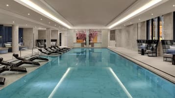 Indoor pool, open 7:00 AM to 8:00 PM, pool loungers