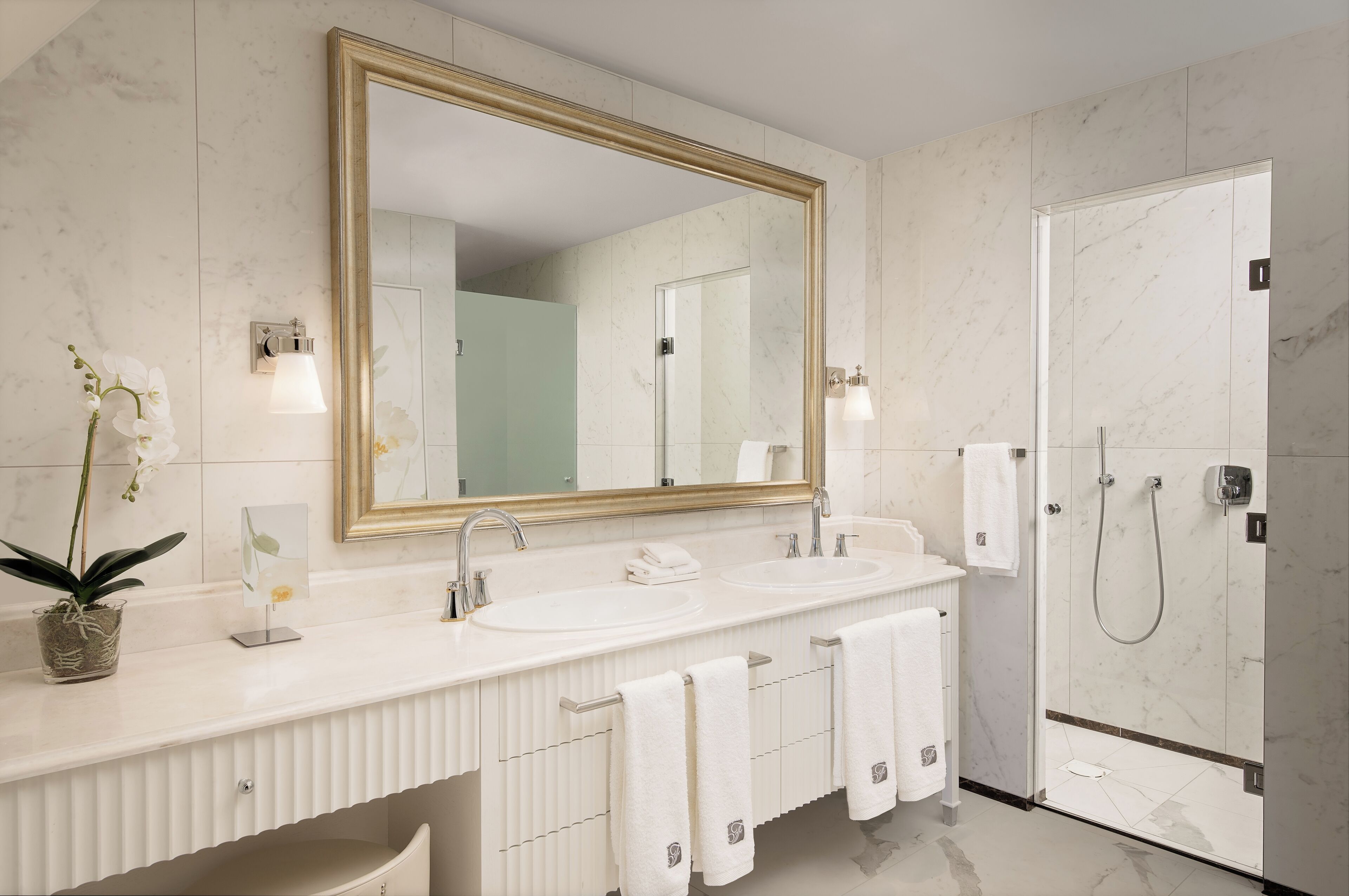 luxury two bedroom king suite | bathroom | bathrobes, slippers, towels