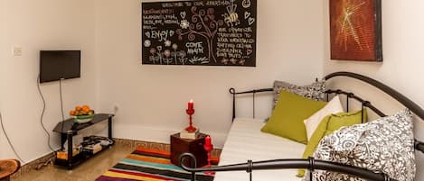 30-inch flat-screen TV with cable channels, TV