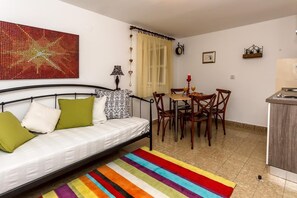 30-inch flat-screen TV with cable channels, TV