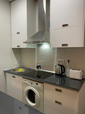 Fridge, microwave, coffee/tea maker, electric kettle