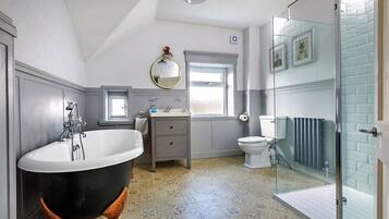 Bathtub, hair dryer, towels, soap