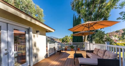 STUNNING HOME WITH SPA, FRONT AND BACK YARD, HUGE DECK, OUTSTANDING LOCATION
