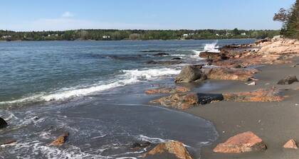 The real deal! Oceanfront home with private beach and expansive island view.