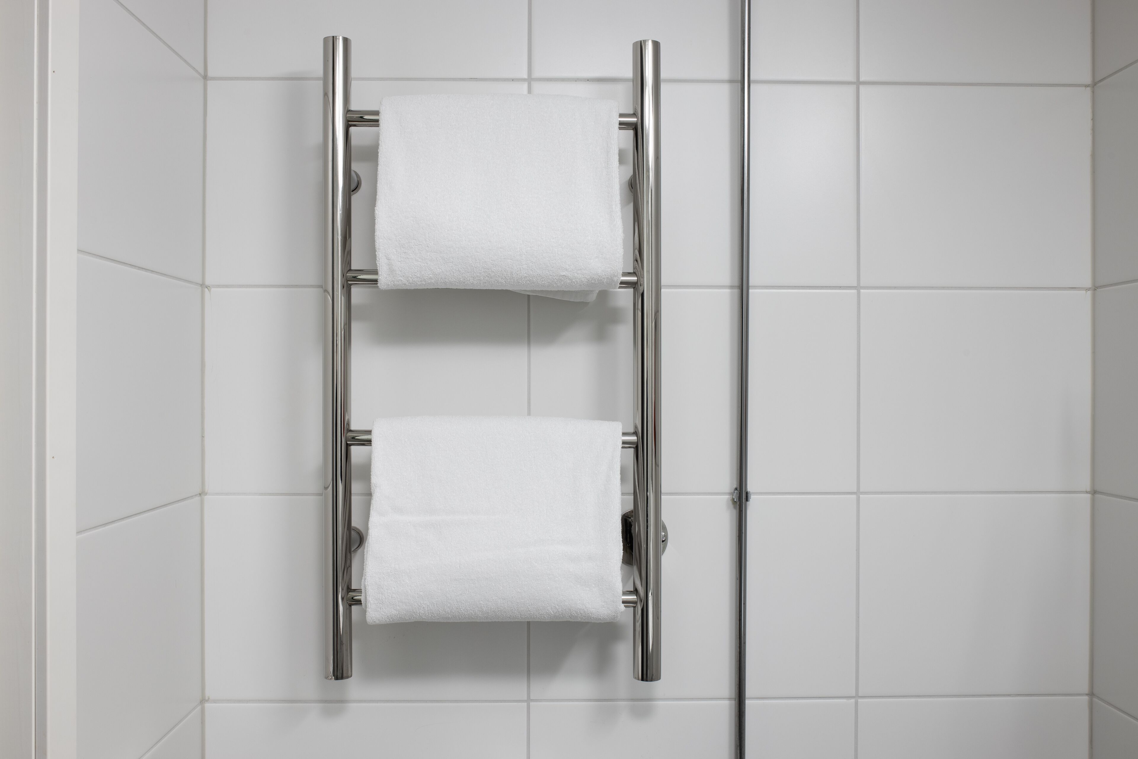 family room | bathroom amenities | shower, hair dryer, towels