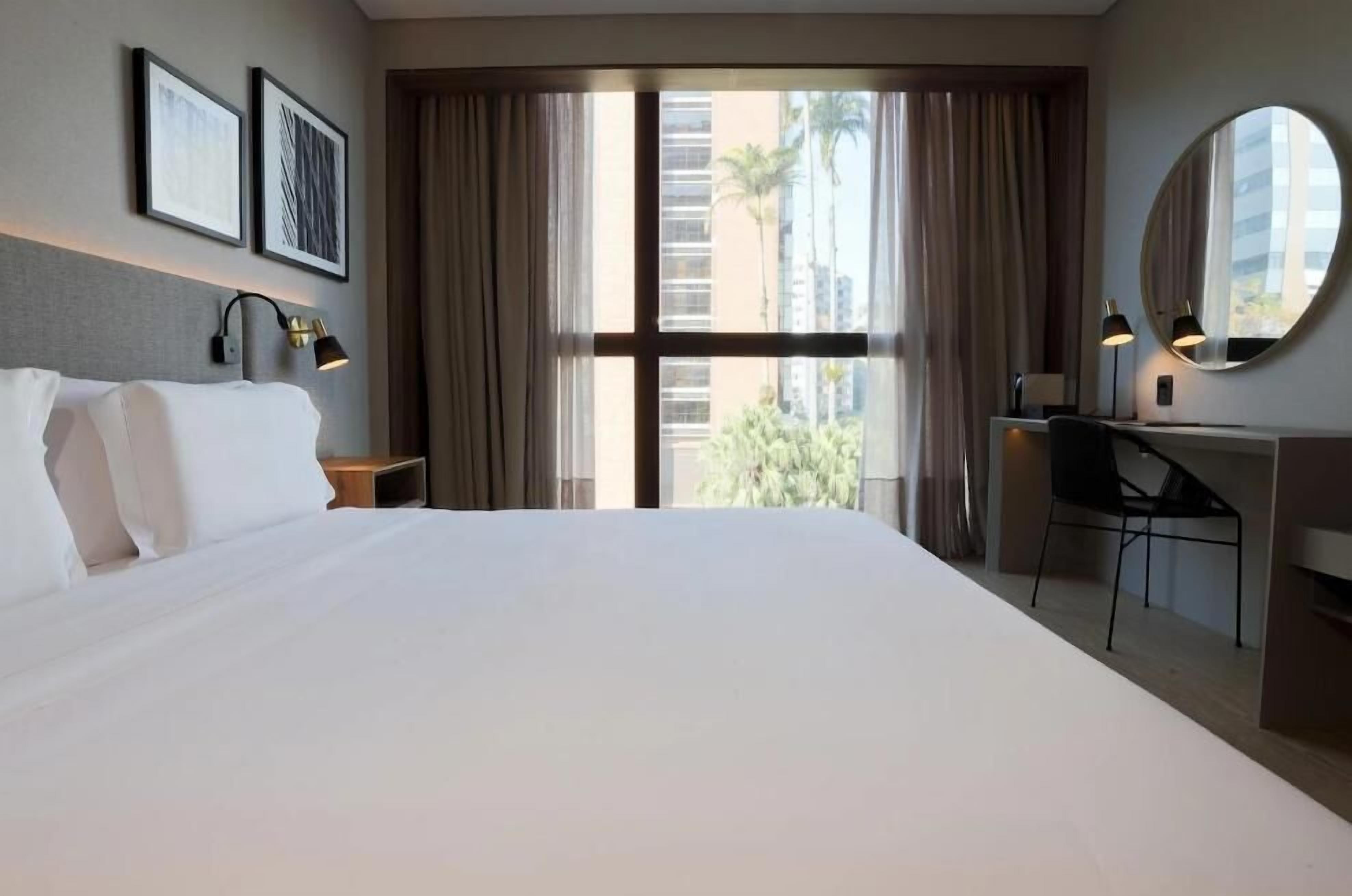 Premium bedding, pillow-top beds, minibar, in-room safe