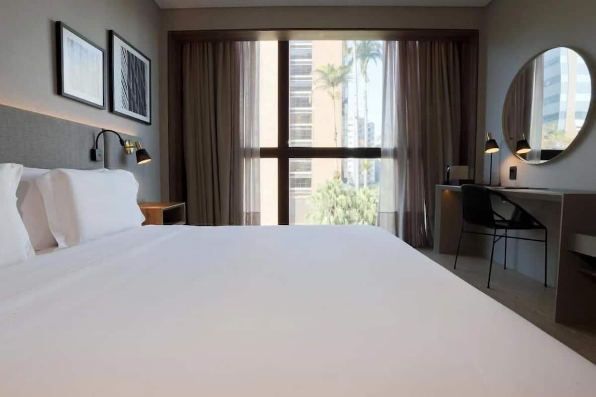 Premium bedding, pillow-top beds, minibar, in-room safe