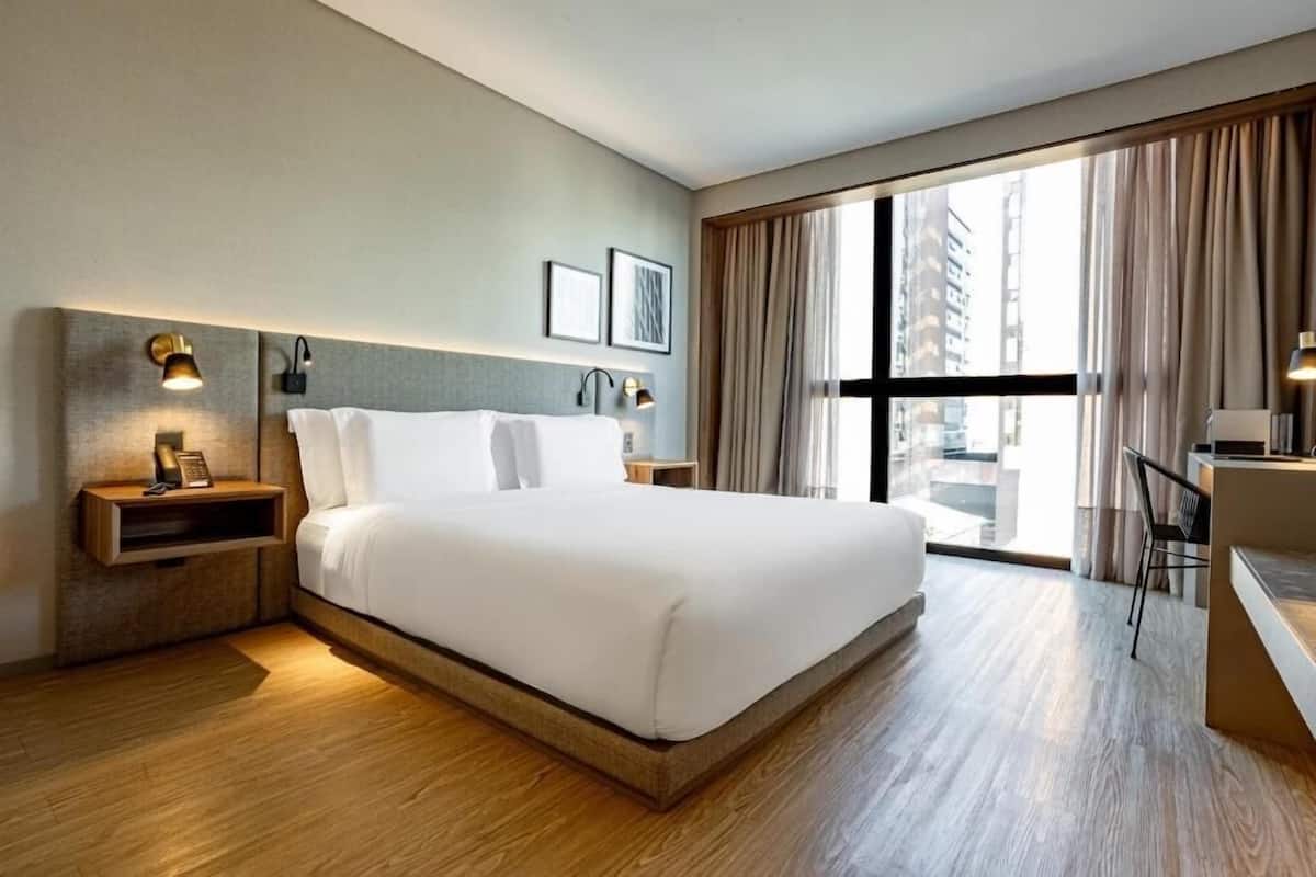 Premium bedding, pillow-top beds, minibar, in-room safe