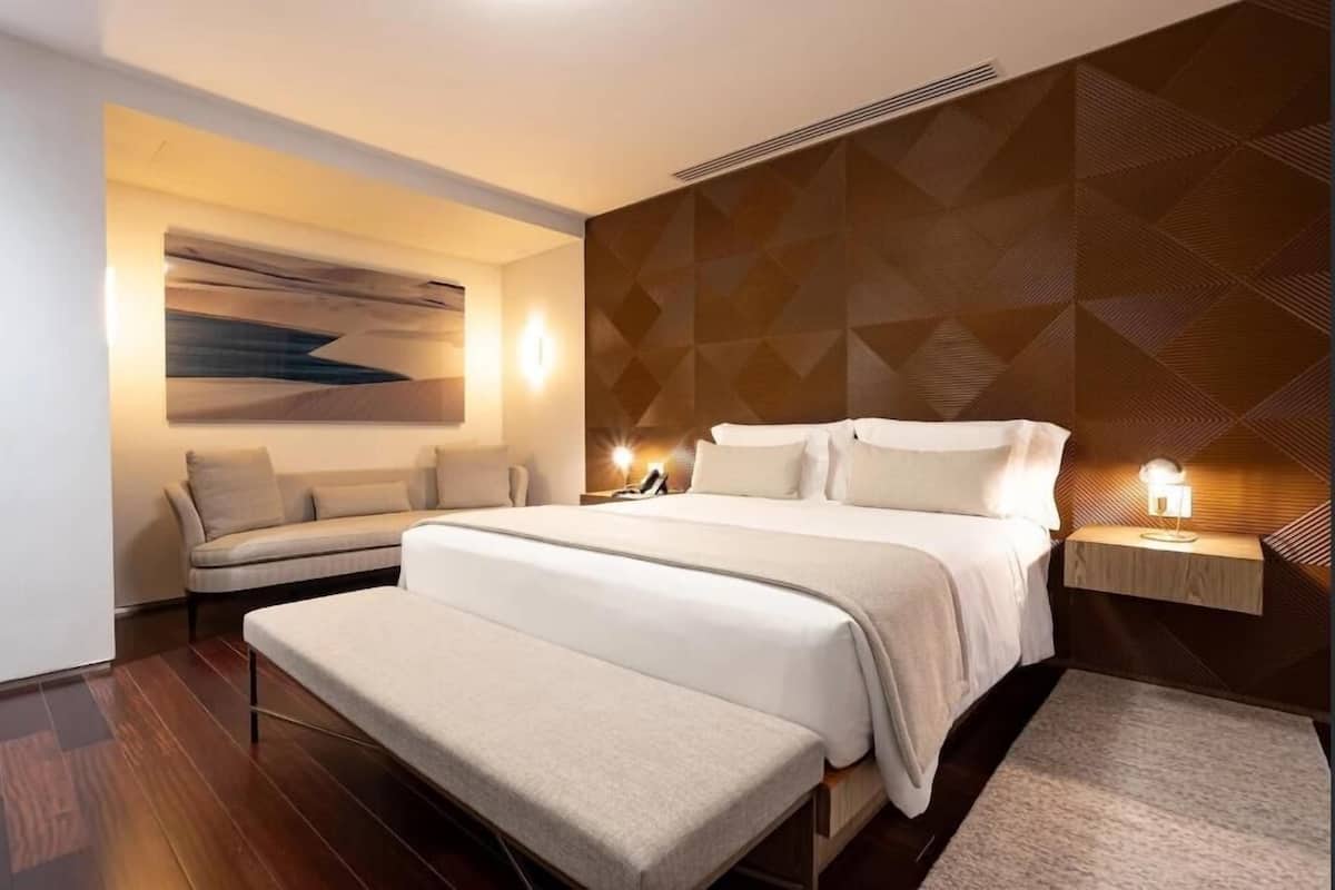 Premium bedding, pillow-top beds, minibar, in-room safe