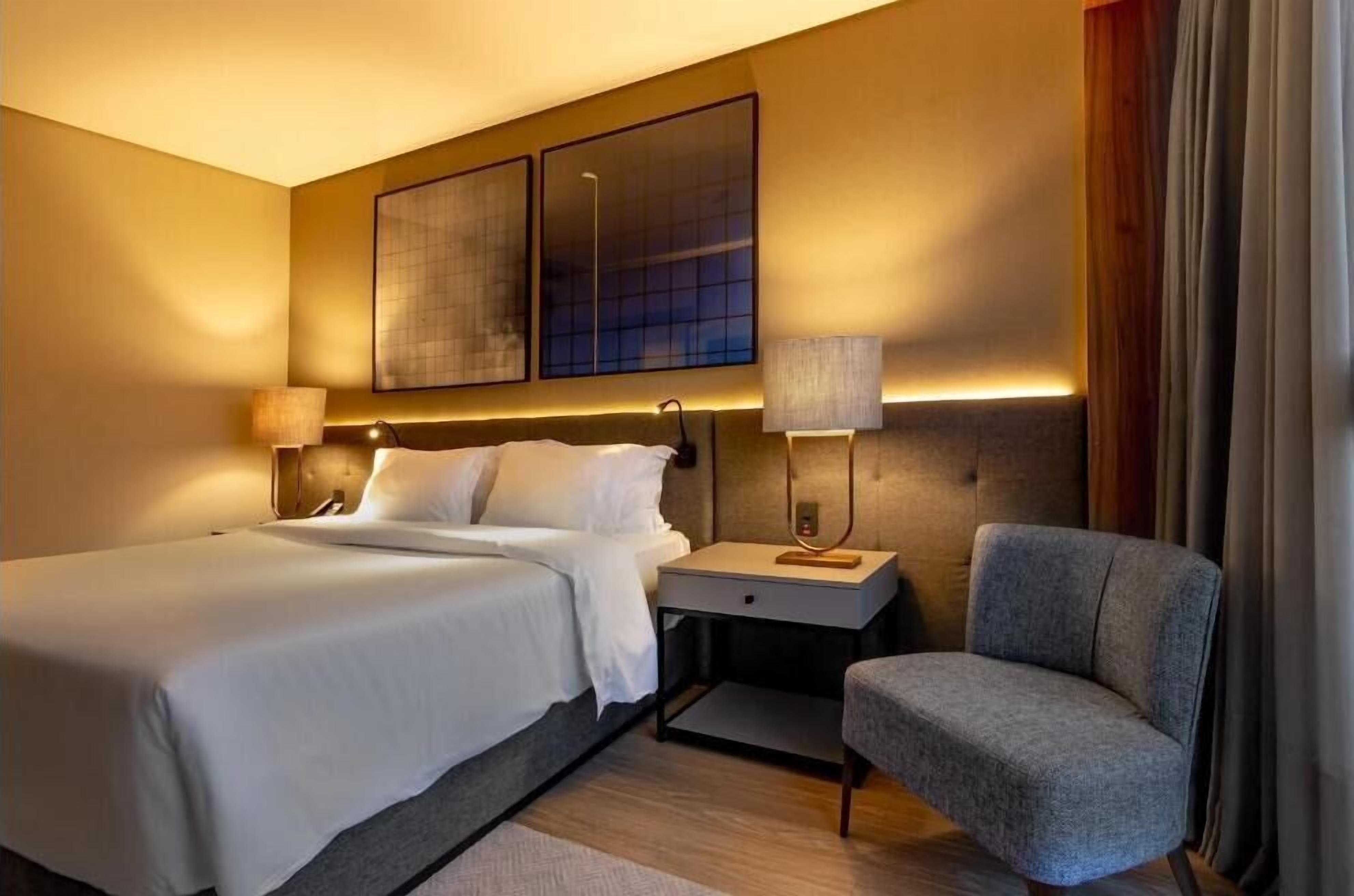 Premium bedding, pillow-top beds, minibar, in-room safe