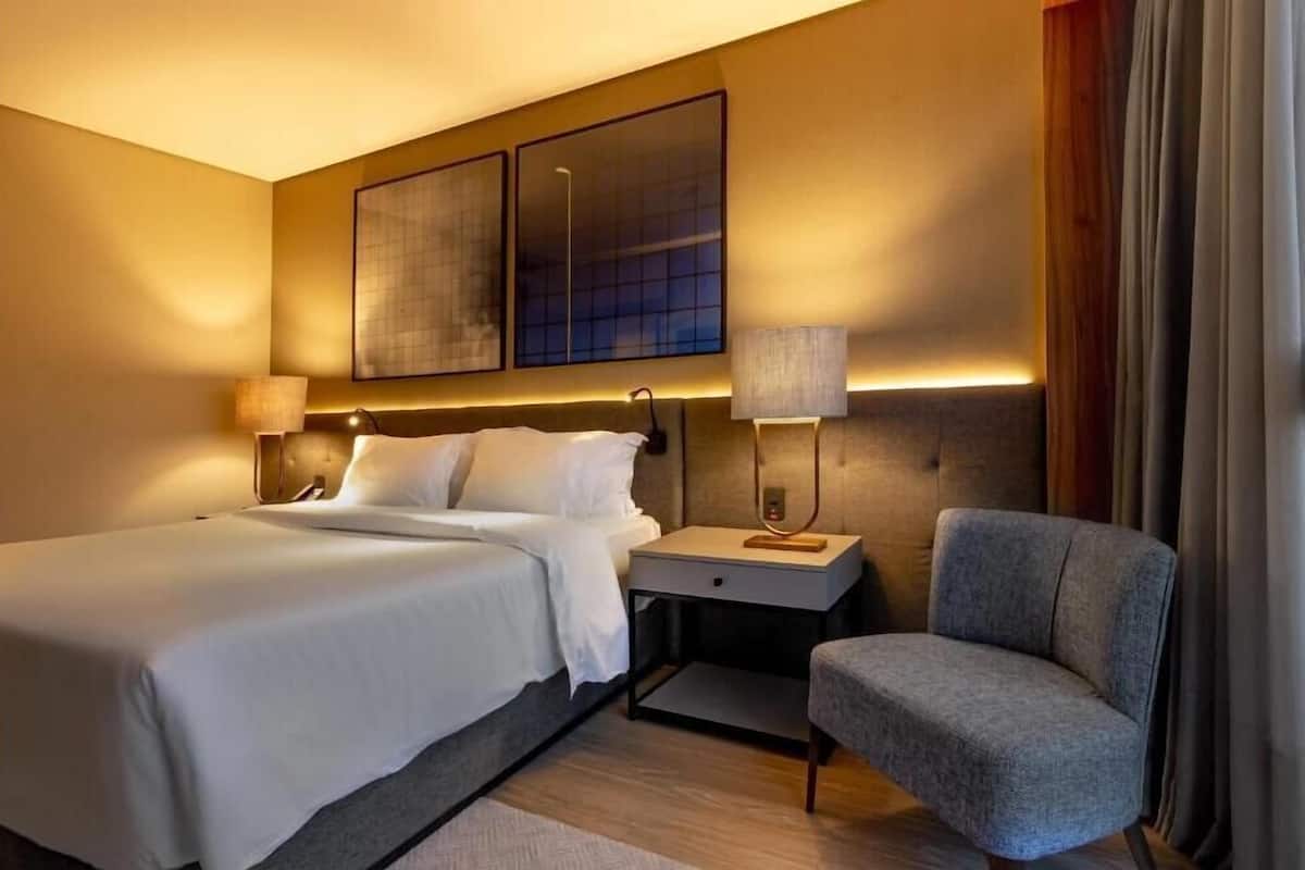 Premium bedding, pillow-top beds, minibar, in-room safe