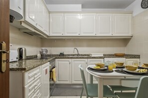 Coffee/tea maker, fridge, microwave, electric kettle