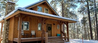 Nestled-in-pines, sooth-your-soul custom home with an incredible mountain view. 