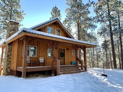 Nestled-in-pines, sooth-your-soul custom home with an incredible mountain view. 