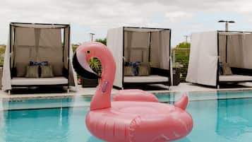 Relax by the pool with a comfortable seating area and a fun inflatable float.
