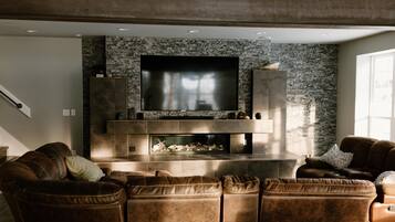 Smart TV, fireplace, books