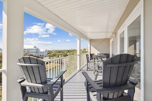 Outdoor dining - Bright Coastal Escape with Gulf View | Community Pools, Balcony, & Beach Access (Gulf Place 30A)