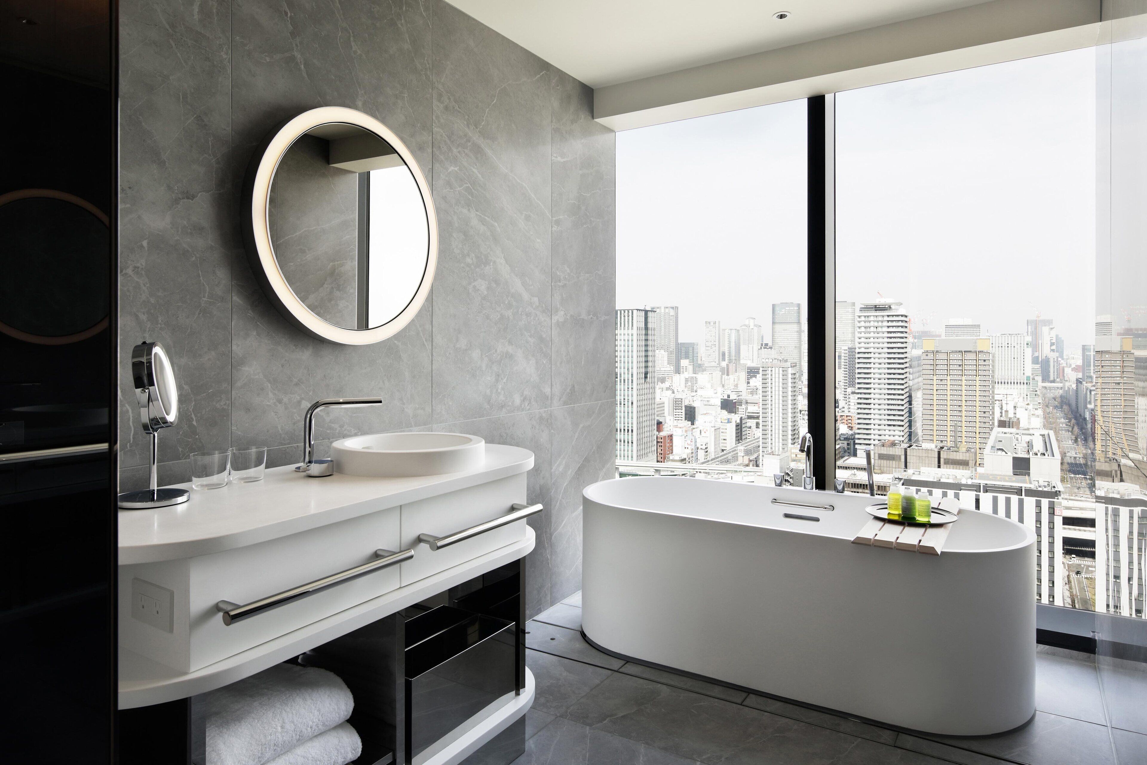 room, 1 king bed, non smoking, city view (corner, city view) | bathroom | separate bathtub and shower, free toiletries, hair dryer, bathrobes