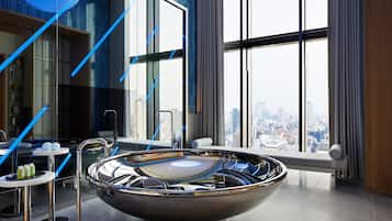 Separate tub and shower, free toiletries, hair dryer, bathrobes