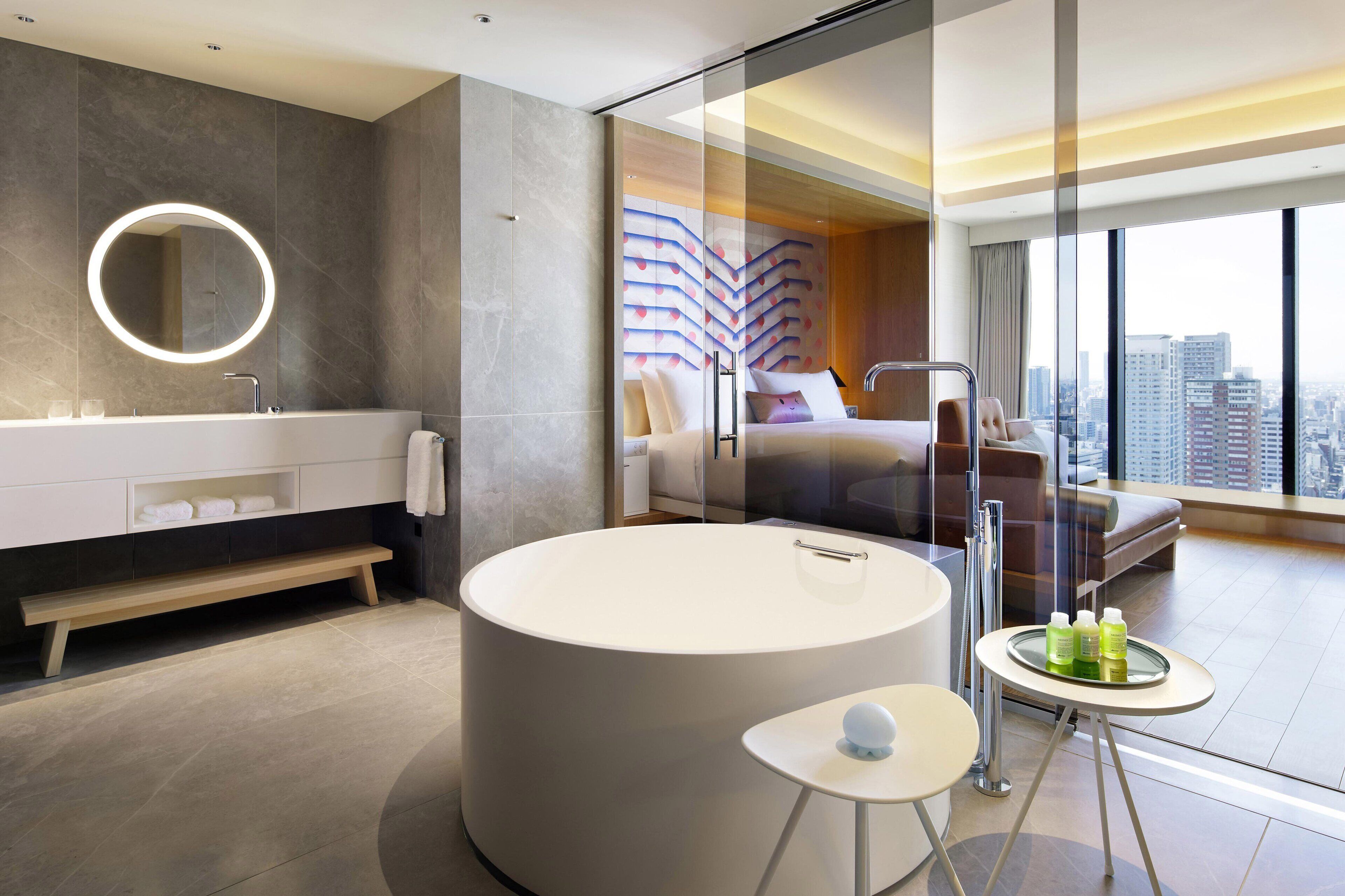 suite, 1 king bed | bathroom | separate bathtub and shower, free toiletries, hair dryer, bathrobes