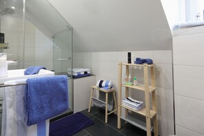 Shower, hair dryer, towels, soap