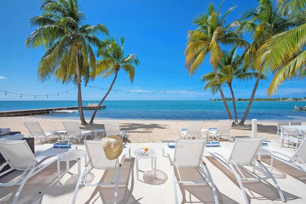 On the beach, sun-loungers, beach towels