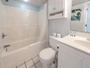 Combined shower/tub, hair dryer, towels, shampoo