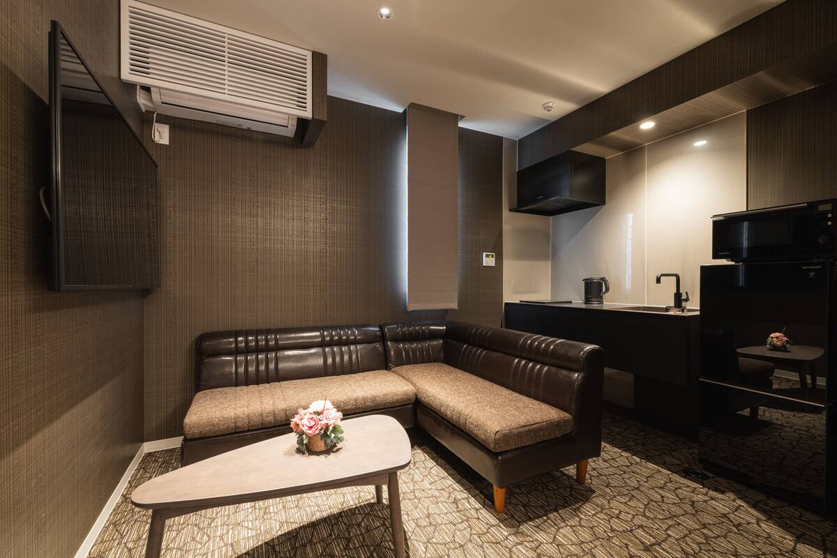 standard a, non smoking | living area | flat-screen tv