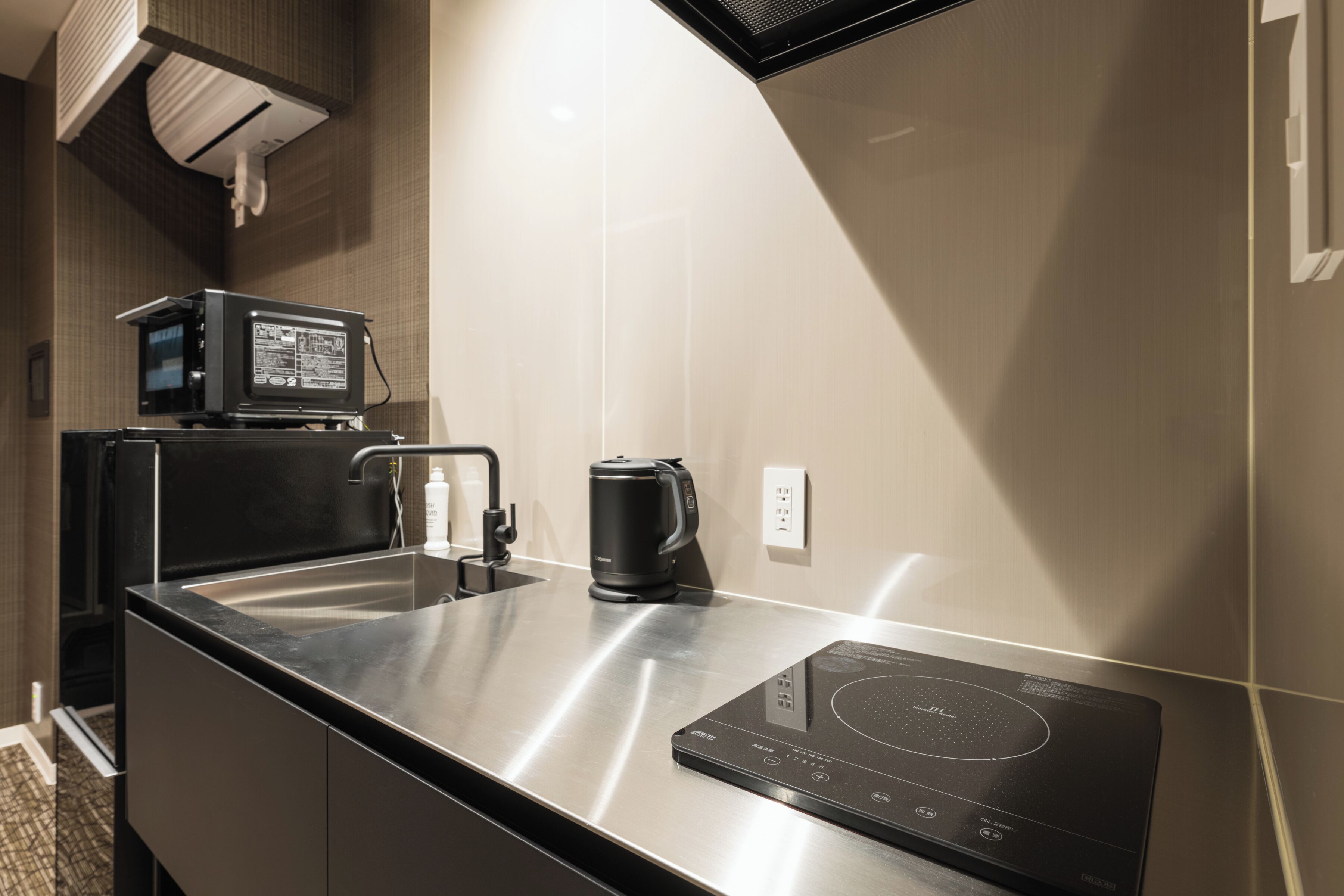 Full-size fridge, microwave, stovetop, electric kettle