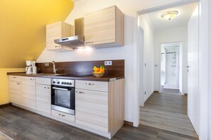 Frigorífic, forn i trona 