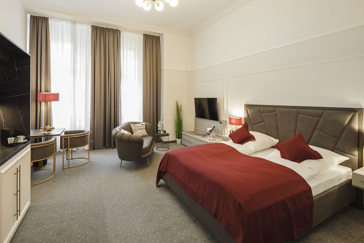 Comfort tweepersoonskamer | Hypoallergeen beddengoed, een minibar met enkele gratis items
